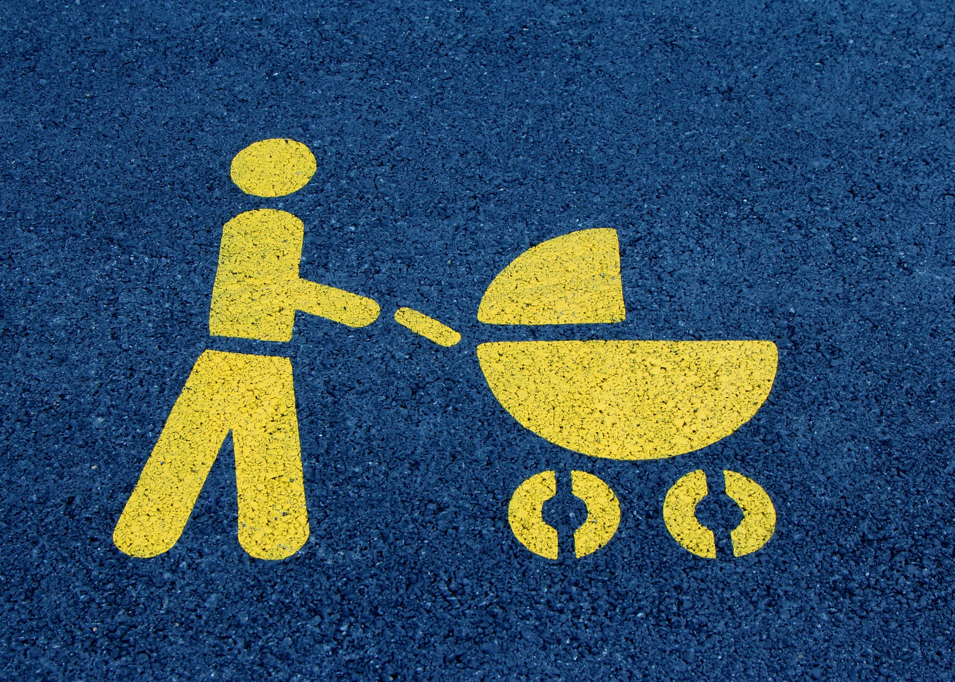 Family using public transit in Miami with stroller and kids at downtown Metrorail station