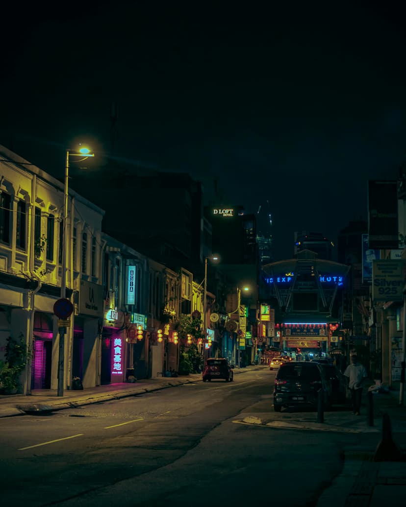 Nighttime street scene in Little Havana with people outside Ball & Chain