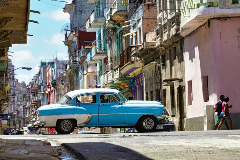 Colorful rooster statue and Calle Ocho streetscape in Little Havana