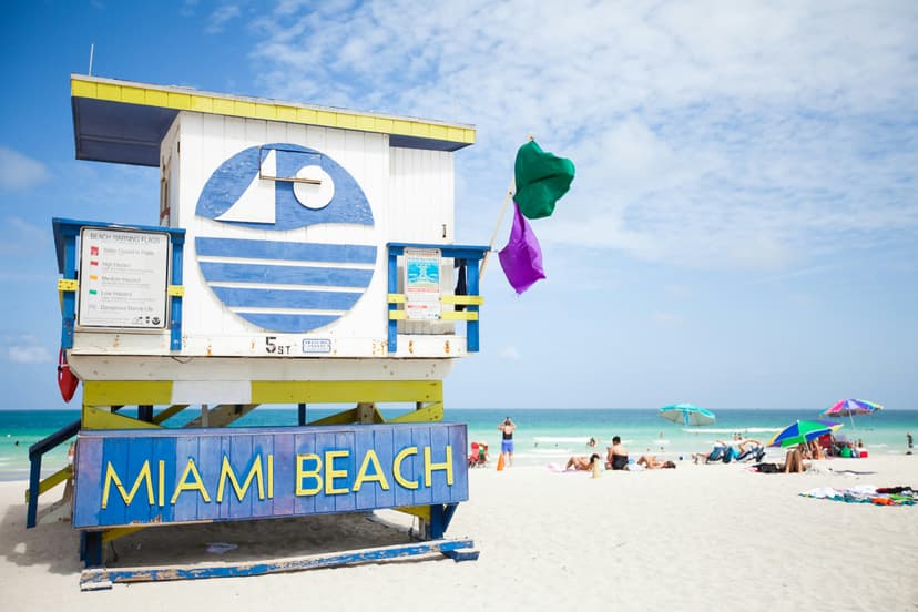 Split view of Miami Beach shoreline and Brickell skyline