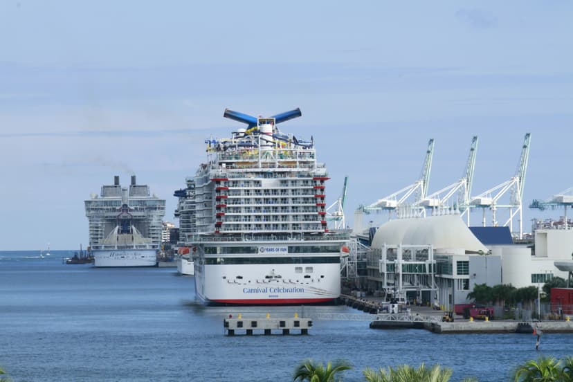 Cruise ship departing PortMiami with Downtown skyline in background